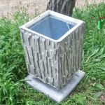 אשפתון בטון מרובע עם טקסטורה